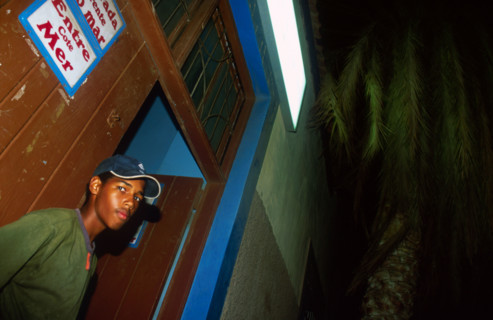 Island boy at night