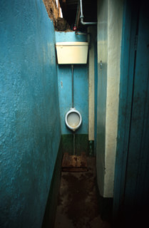 The urinal in the toilets at the Fariri Cafe in Isiolo, where we stopped for Andazi, a doughy triangular food. As we ate CNN was playing in the background - news about the recession in Germany