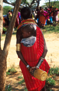 A Samburu child on his mother