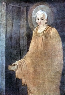 Bouddha mendiant dans sa toge jaune safran