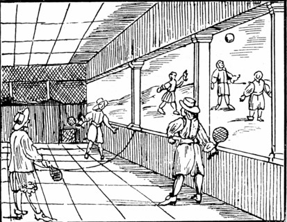 Young men playing a form of tennis