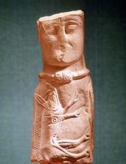 Image of Celtic deity with wild boar and wearing torque