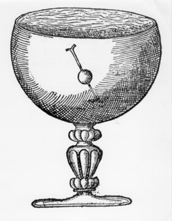 A magnetized needle pushed through a ball of cork, and floating submerged in a goblet of water, shows dip and the direction of the magnetic pole