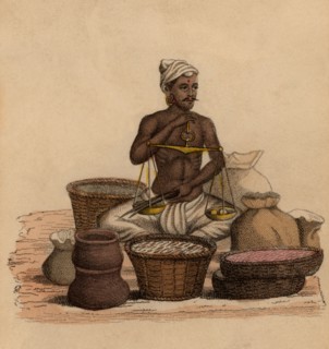 Indien pesant des ingrédients afin de préparer du bétel