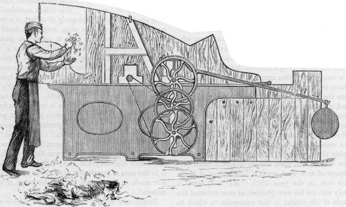 Placing sorted woollen rags in a grinding machine called a Devil