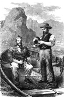 Diver being assisted into a Siebe and Gorman diving suit
