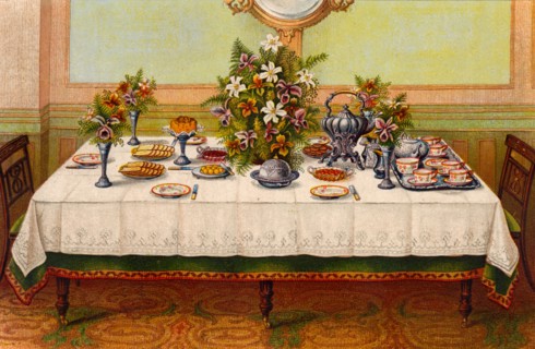Table covered with a linen cloth and set for Afternoon Tea