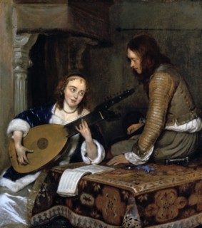 Young woman playing a lute: Dutch interior
