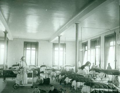 Children's ward in a hospital where nuns act as nurses