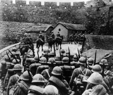 Japanese soldiers enter a city in China, Circa 1937