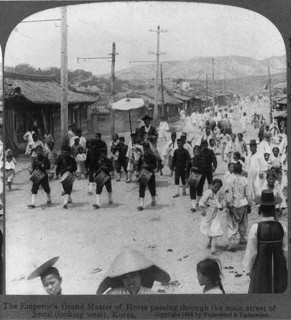 The Emperor's Grand Master of Horse passing through the main street of Seoul
