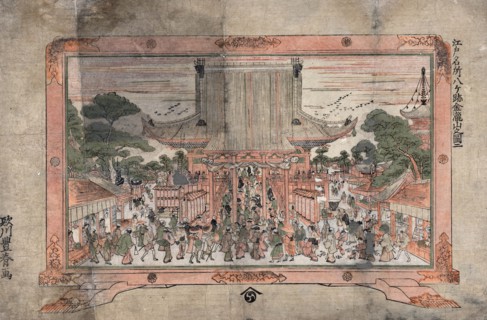 People entering a large temple