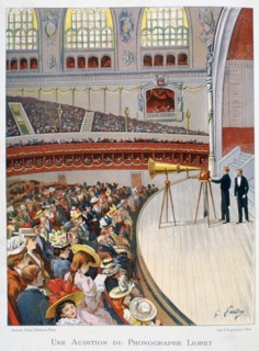 Demonstration on the stage of a crowded auditorium