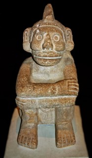 Stone seated figure of Xochipilli