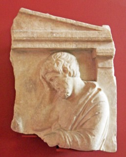 Grave relief depicting a man in sorrow