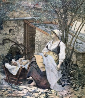 Young mother sitting in the corner of a garden