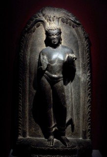 Buddha depicted in a sculpted relief in Stone