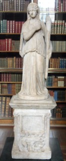 Statue of Demeter on an altar