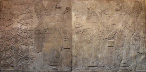 King Ashurnasirpal guarded by two eagle headed spirits