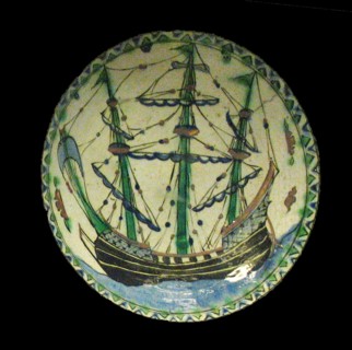 Dish painted with a pagoda-like structure