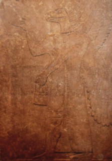 Assyrian winged genie figure