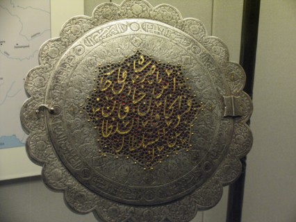 Mirror and stand with an open work dedication