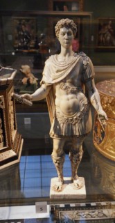 Ivory figurine depicting a man in armour