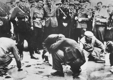 Austrian Nazis and local residents humiliating Jews