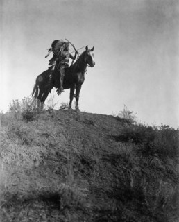 Native American Indian man in feather headdress