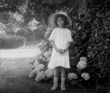 French girl in a garden