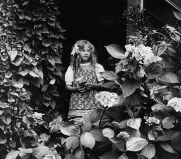 French girl in a garden