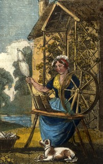 Cottager sitting outside her cottage