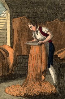 The Currier working at a beam board