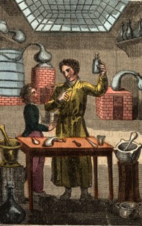 The Chemist instructing his young apprentice