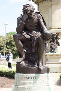 statue commemorating shakespeare's work.