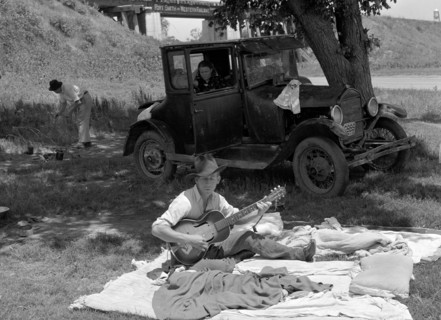 Camp of migrant workers near Prague, Oklahoma. Lincoln County by Russell Lee, 1903-1986, dated 19390101.