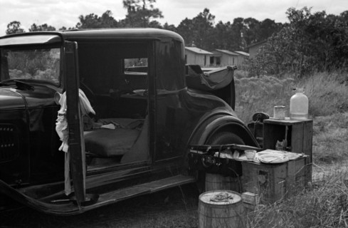 Car used by migrant agricultural workers; the rear has been fixed up as a bed, near Winter Haven, Florida 19370101.