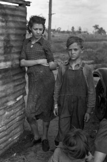 Part of the family of a migrant fruit worker from Tennessee, camped near the packinghouse in Winter Haven, Florida 19370101