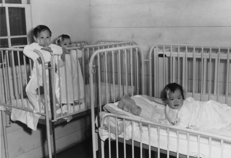 Photograph of two American-Japanese babies at an orphanage