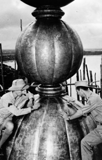 Photograph of Corporal Anthony J. Scopelliti, and Private First Class John C. Byron, Jr. on top the Taj Mahal dome