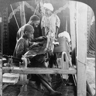Photographic print of shawl weavers in India