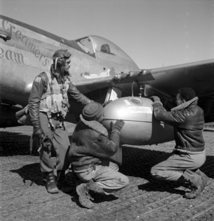 Photograph of Edward C. Gleed and two unidentified Tuskegee airmen, Ramitelli, Italy