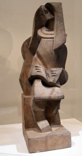 Sculpture titled 'Personnage assis lisant' by Jacques Lipchitz