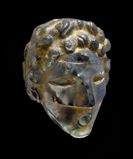 Gold painted glass wall fountain mask by Henri Edouard Navarre