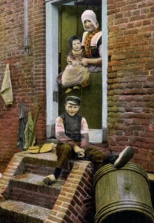 Dutch family in the doorway of their home 1890
