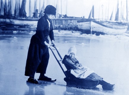 In Holland. Photo possibly shows boy and girl in Volendam