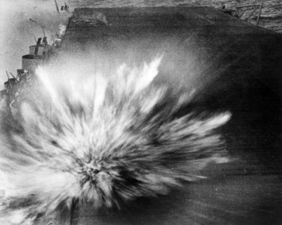 World War Two : A Japanese bomb explodes on the flight deck of Enterprise on 24 August 1942
