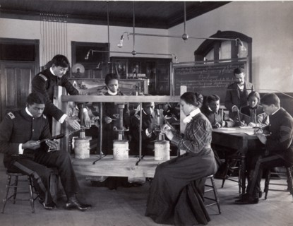 The cheese press screw - students studying agricultural sciences, Hampton Institute, Hampton, Virginia. 1900