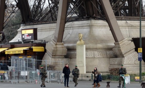Soldiers at the Eiffel Tower, Paris provide security