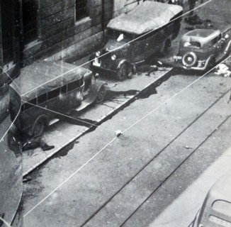 casualties and injured lie on the streets during the Siege of Gijón, in the Spanish Civil War
